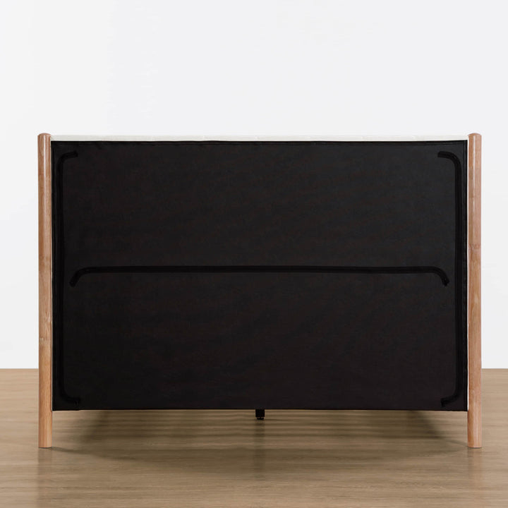 Back view of Serene upholstered platform bed with wooden legs and black fabric - CHITA Living