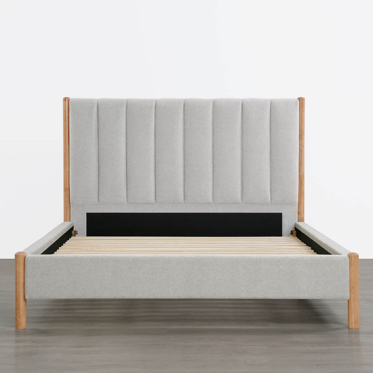 Modern cream upholstered queen-size bed with tall headboard and wooden legs - CHITA Living