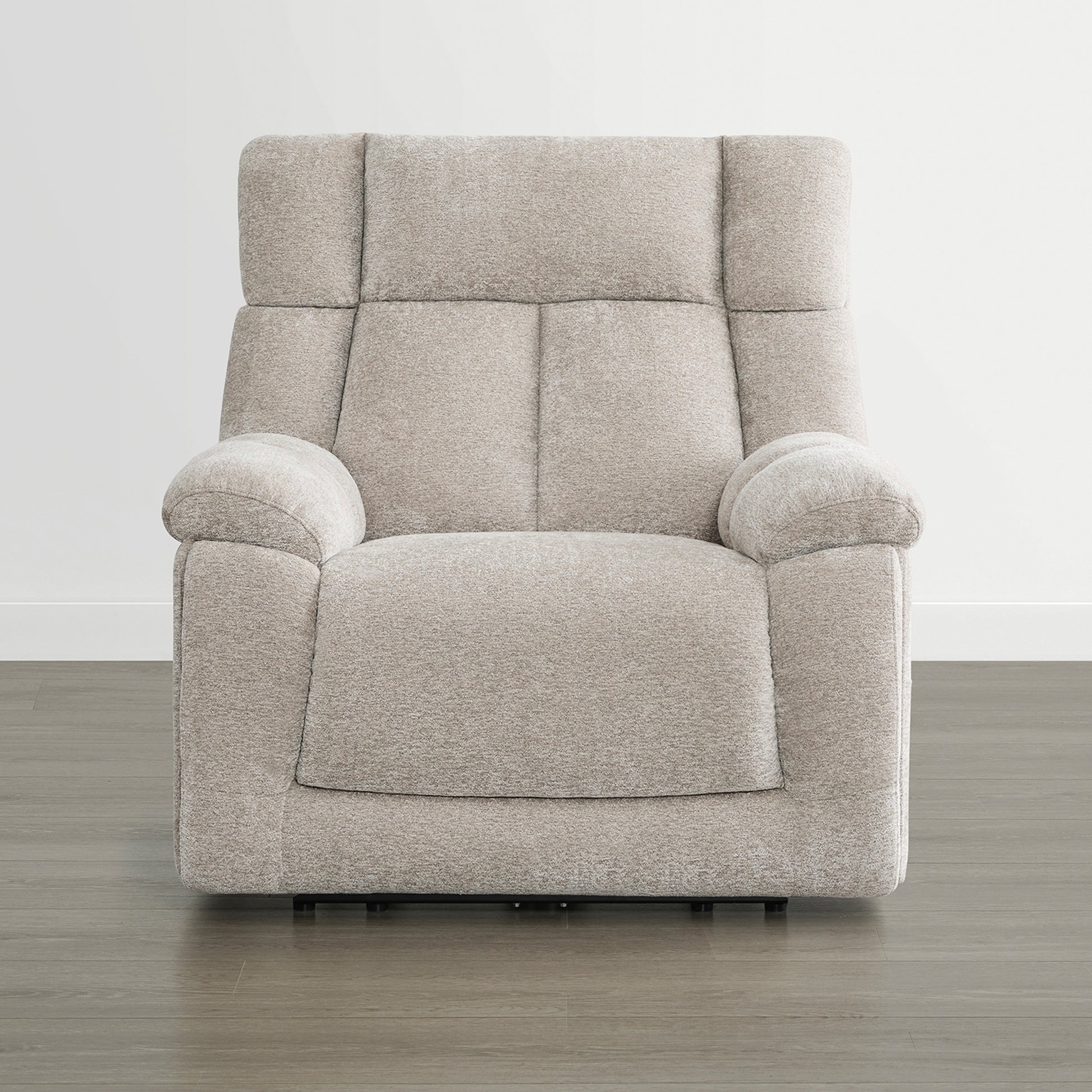 The Sonia Recliner, in soft beige fabric, features built-in Bluetooth speakers and power lumbar support for ultimate comfort.