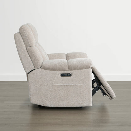 The Sonia Recliner, in beige fabric, features Bluetooth speakers and power lumbar support with a raised footrest.