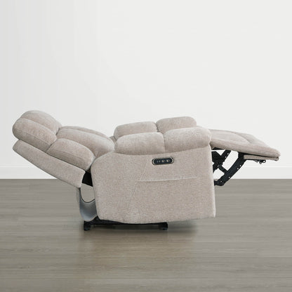 The Sonia Recliner, in beige fabric, features Bluetooth speakers and power lumbar support with an extended footrest.