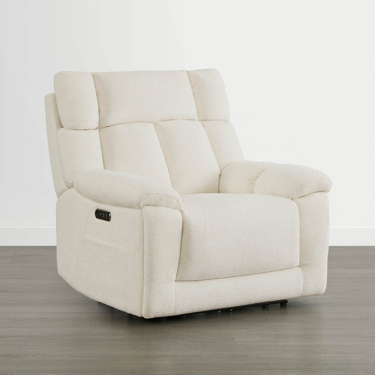 The Sonia Recliner, in cream fabric, features Bluetooth speakers and power lumbar support for ultimate comfort.