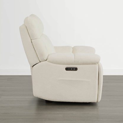 The Sonia Recliner, in cream fabric, offers Bluetooth speakers and power lumbar support for ultimate relaxation.