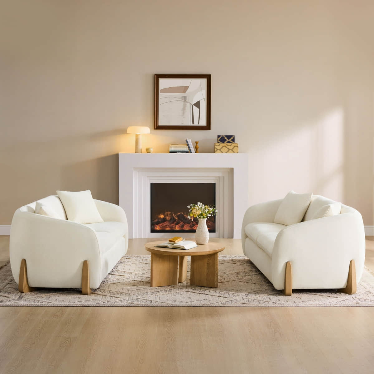Cream modern sofas with wood accents in a stylish living room setup.