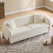 Overhead view of a chic, cream-colored sofa with a contemporary design.