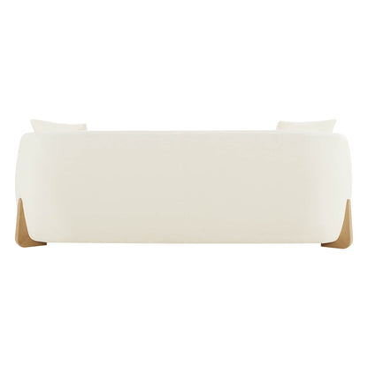 Sleek modern sofa with wood accents, minimalist design