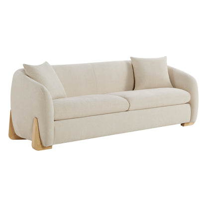 Front view of a modern cream sofa with a smooth, rounded design and wooden legs, featuring two cushions on the seating area.