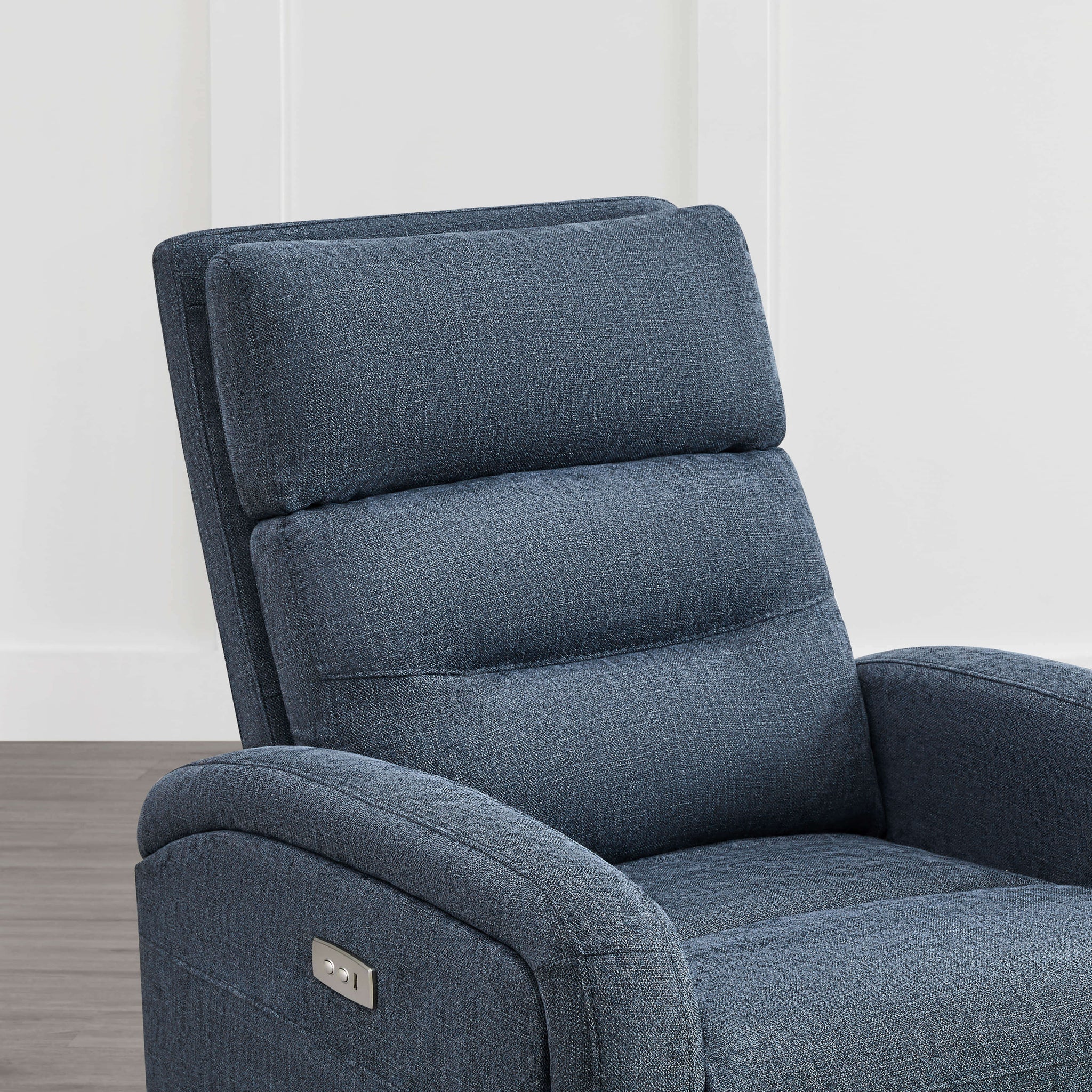 Close-up of dark blue Theo Power Swivel Glider Recliner showcasing plush cushions and headrest - CHITA Living
