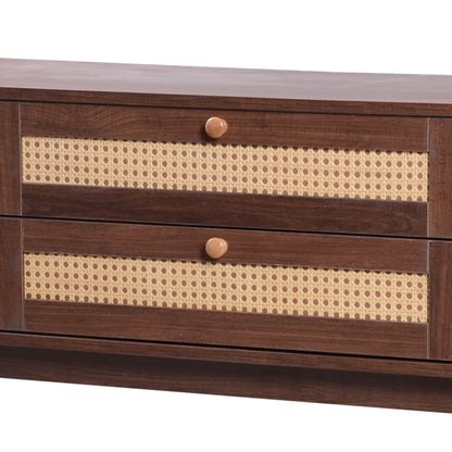 Close up of two light rattan drawers on a dark modern tv stand.