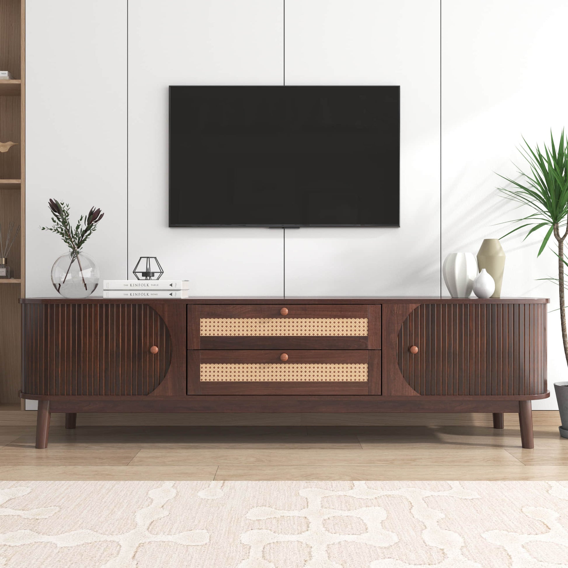 Modern tv stand front view dark wood in a decorated living space.