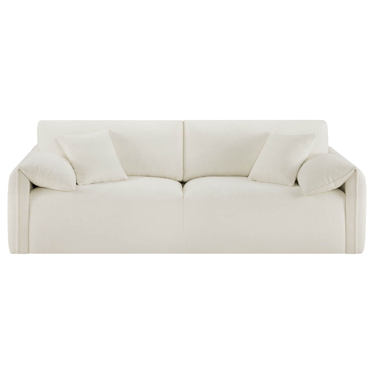 The Winsley 3-Seat Sofa with Ottoman is a sleek, beige couch featuring plush cushions and a minimalist design.