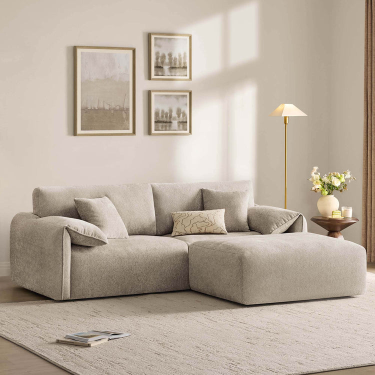 Winsley 3-Seat Sofa with Ottoman in a cozy living room, featuring soft upholstery, matching ottoman, and stylish decor accents.