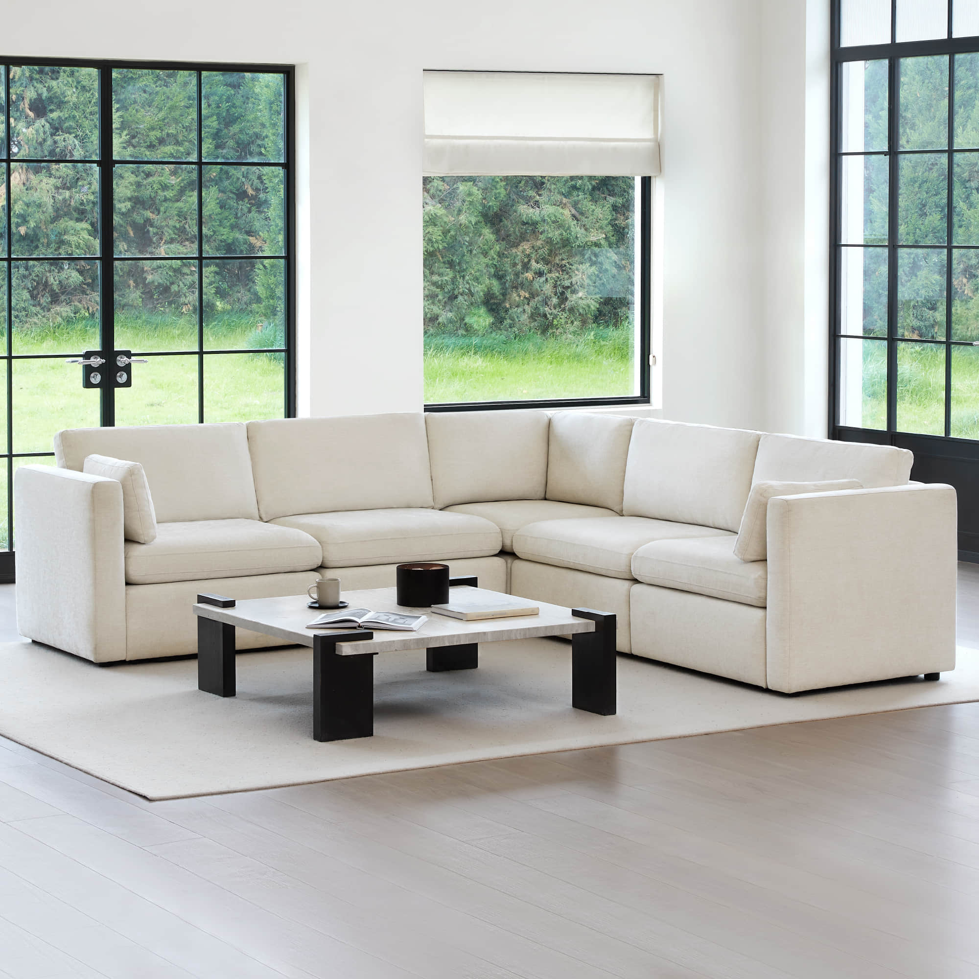 Delaney 5-Piece Corner Modular Sofa Chaise in a modern living room setting - CHITA Living