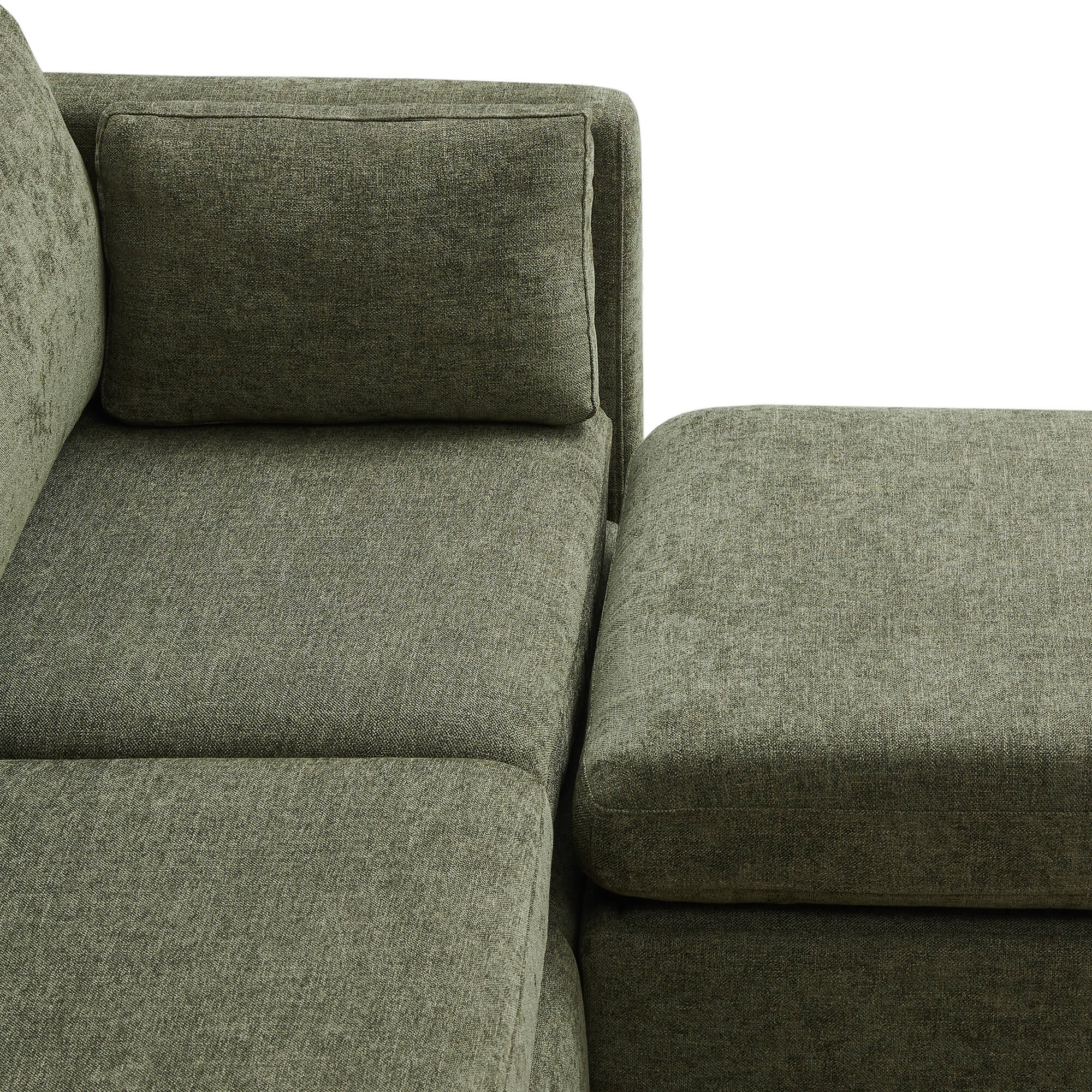 Close-up of soft green cushions on Delaney modular sofa chaise with plush texture - CHITA Living