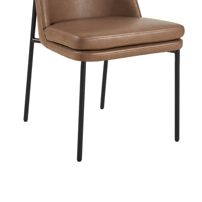 Golda Dining Chair, brown leather with black metal legs, close-up of seat and legs on a white background.