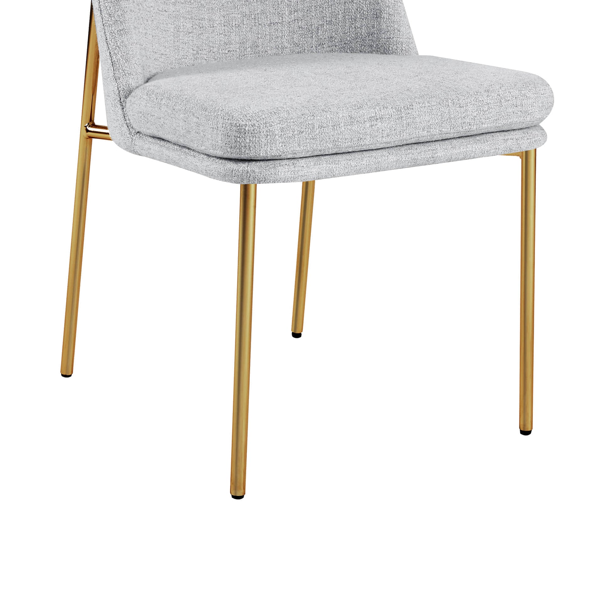 Golda Dining Chair, light gray fabric with gold legs, close-up of seat and front legs.