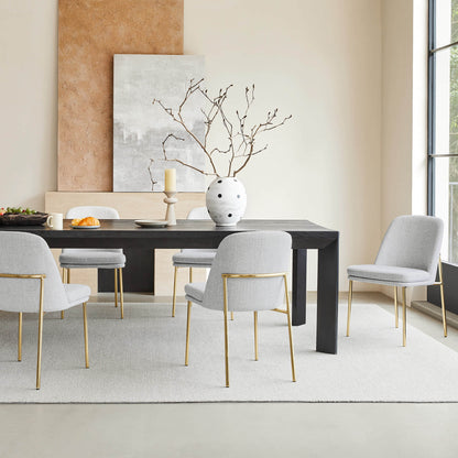 Golda Dining Chair, light gray fabric with gold legs, modern dining room setting.