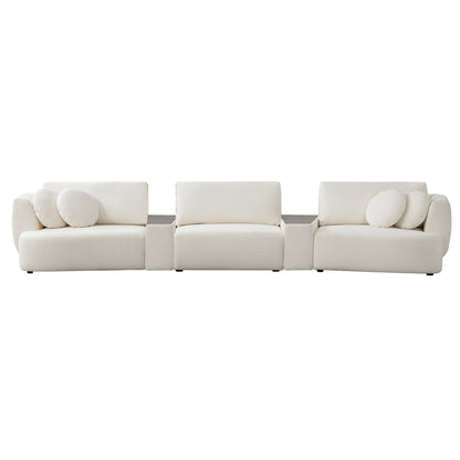 Grace 3-Seat Modular Curved Sofa in light boucle with rounded cushions in modern living room.