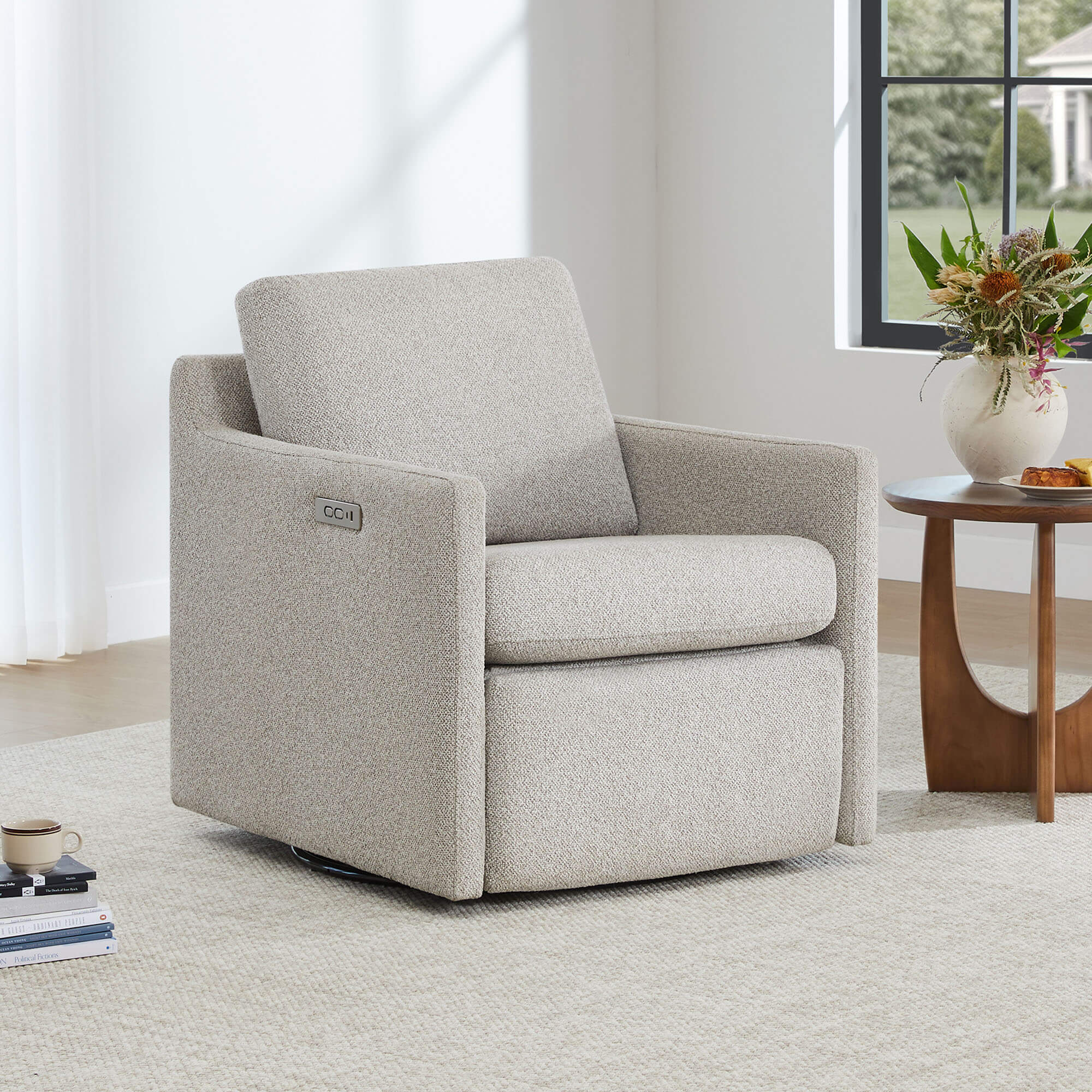 Henry Power Swivel Recliner in a living room setting, light beige fabric.