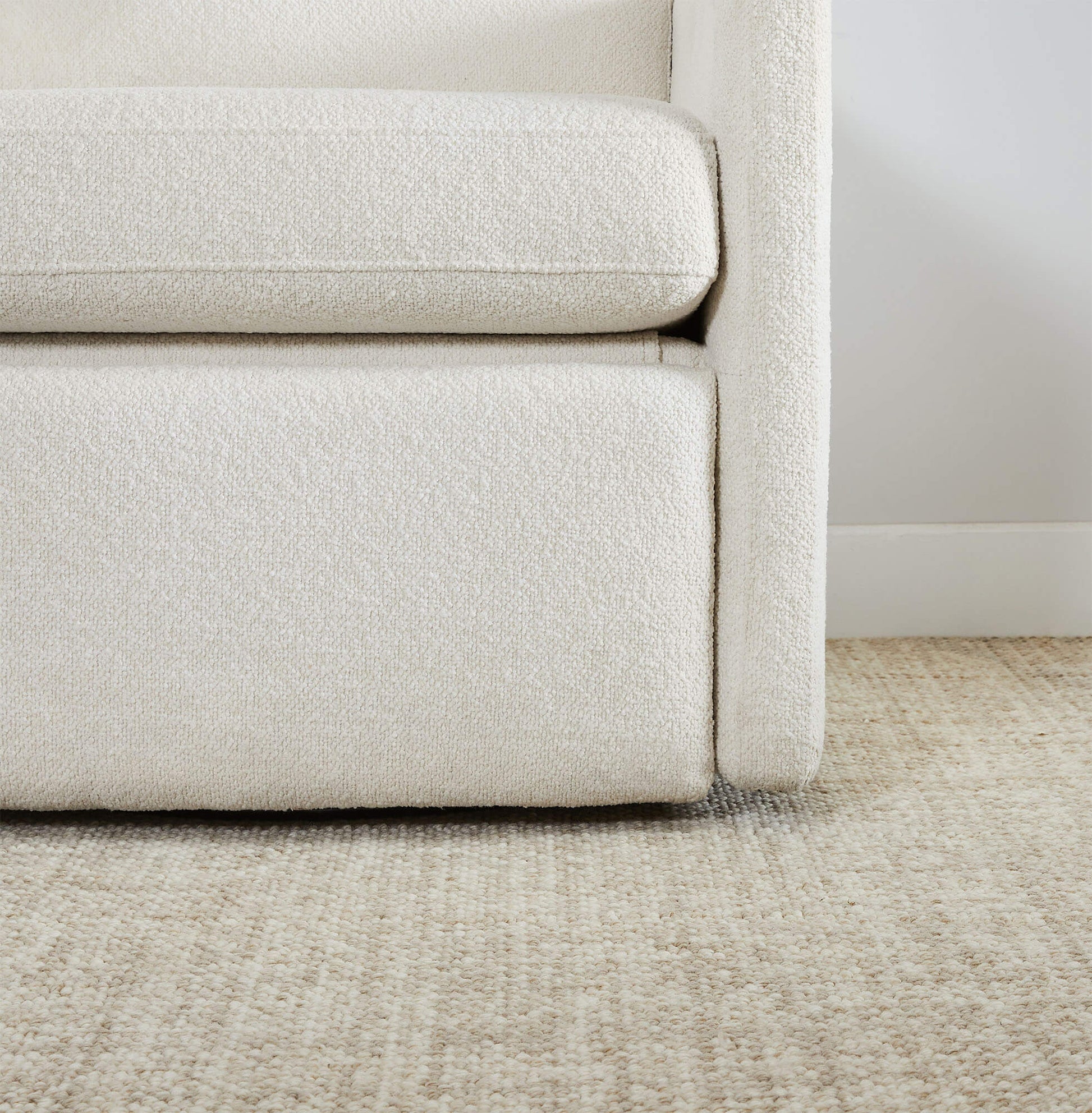 Close-up of Henry Power Swivel Recliner in light beige fabric