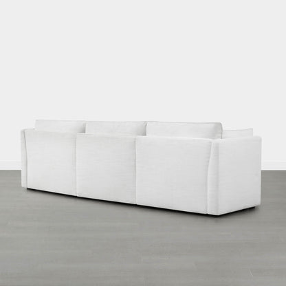 Back view of Sophia 3-piece modular sofa in light fabric against a neutral wall - CHITA Living