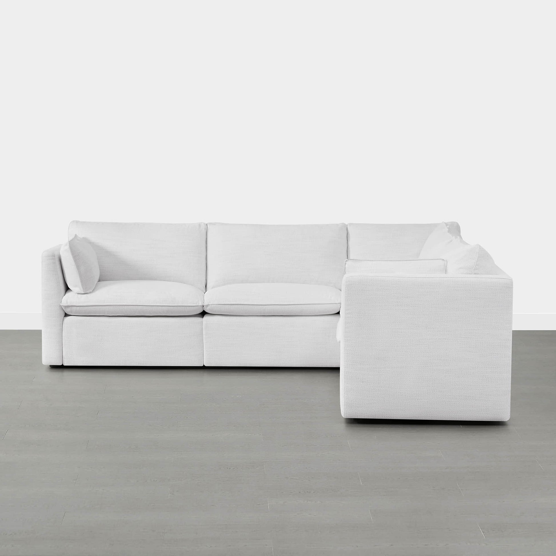 Sophia 5-piece modular sofa in minimalist design with soft cushions and light gray flooring.