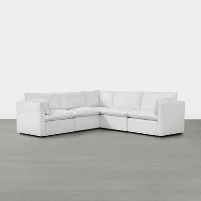 Sophia 5-piece white modular sofa in contemporary living room with light gray flooring.