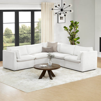 Sophia 5-piece feather modular sofa in a bright living room with a round coffee table - CHITA Living