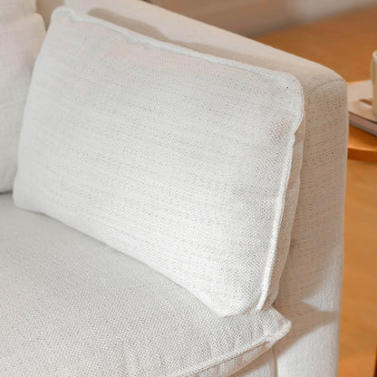 Close-up of white upholstered cushion on Sophia modular sofa - CHITA Living