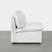 Sophia modular armless chair in clean, white fabric profile view with plush back cushion - CHITA Living