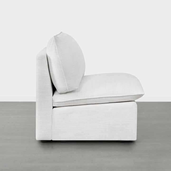 Sophia modular armless chair in clean, white fabric profile view with plush back cushion - CHITA Living