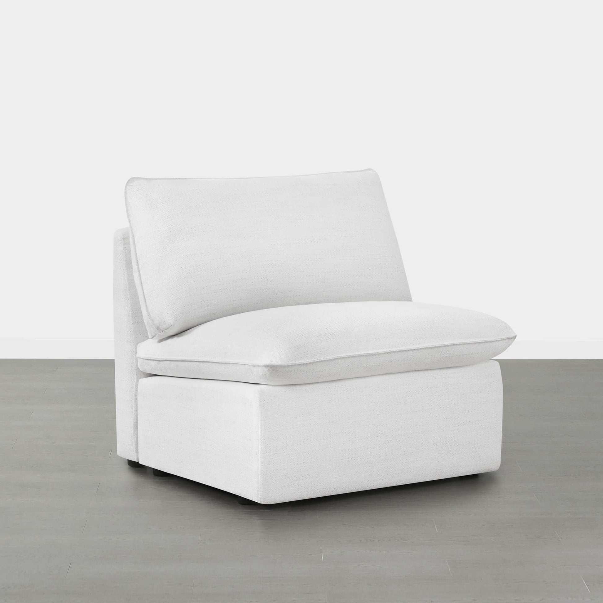 Chic white modular armless chair featuring plush cushions for modern living spaces - CHITA Living