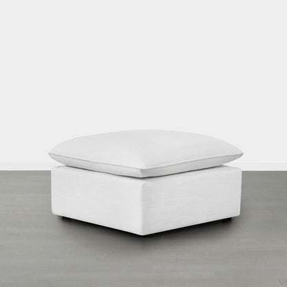 Sophia modular ottoman in light fabric with plush cushion in minimalistic room - CHITA Living