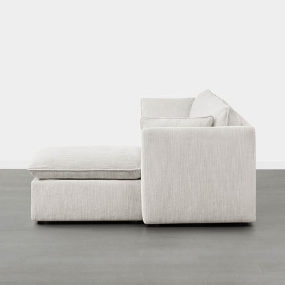 Side view of Sophia 4-piece modular sofa in soft white with chaise lounge - CHITA Living