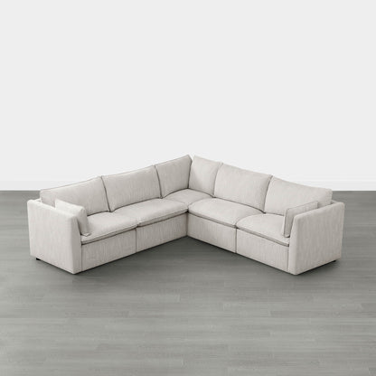 Sophia 5-piece feather modular sofa in light beige fabric in minimalist living room - CHITA Living