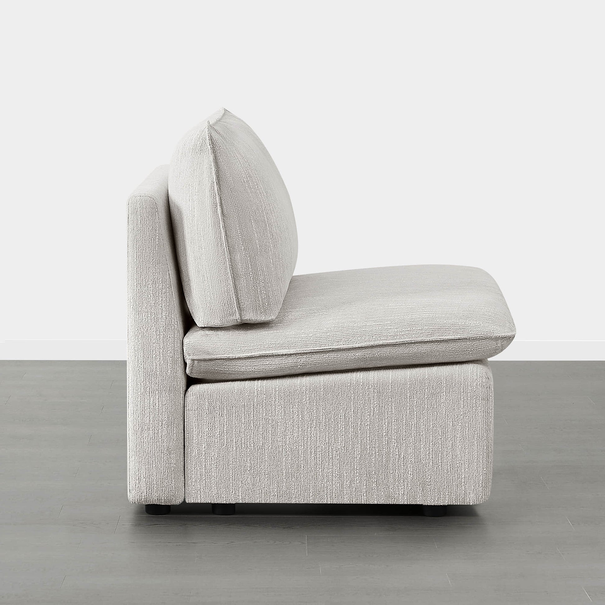 Sophia modular armless chair side view in light gray fabric with plush cushion - CHITA Living