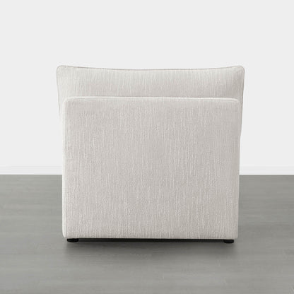 Back view of light fabric armless chair from Sophia modular sofa in neutral space - CHITA Living