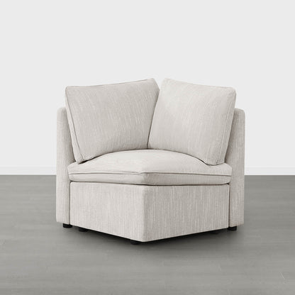 Sophia modular corner seat in light fabric with reversible plush cushions - CHITA Living