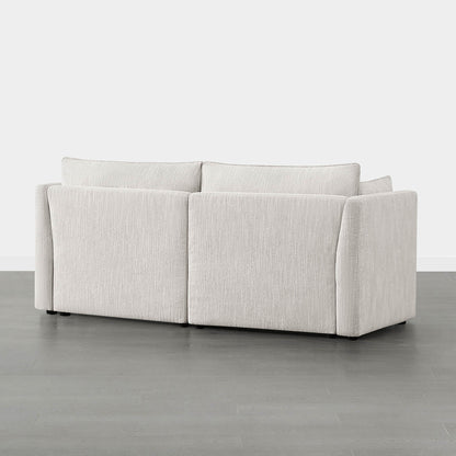 Back view of Sophia 2-piece modular sofa in light fabric with sleek silhouette - CHITA Living