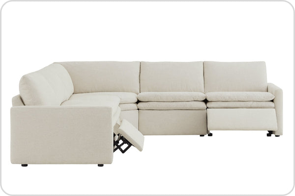 A beige L-shaped sectional sofa with one reclining seat.