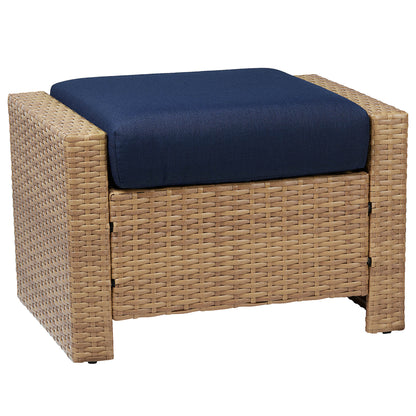 Calum Rattan outdoor ottoman with navy cushion for stylish patio relaxation - CHITA Living