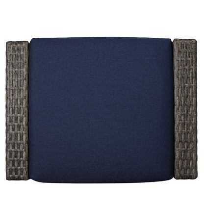 Navy cushion on Calum Rattan outdoor chair with textured rattan armrests - CHITA Living