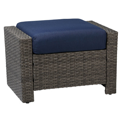 Calum Rattan outdoor ottoman with navy cushion and textured weave for stylish comfort - CHITA Living