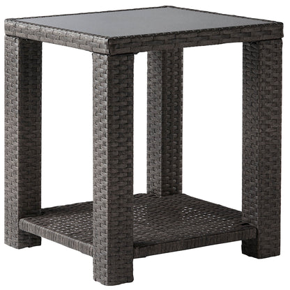 Calum Rattan outdoor side table with textured weave and glass top, perfect for patios - CHITA Living
