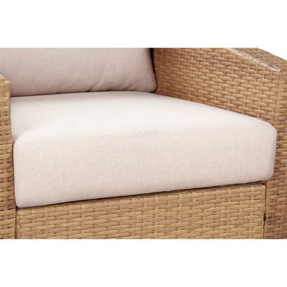 Close-up of Calum Rattan outdoor chair's cream cushion and textured rattan weave - CHITA Living
