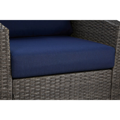 Calum Rattan outdoor chair close-up with navy cushion and textured rattan weave - CHITA Living