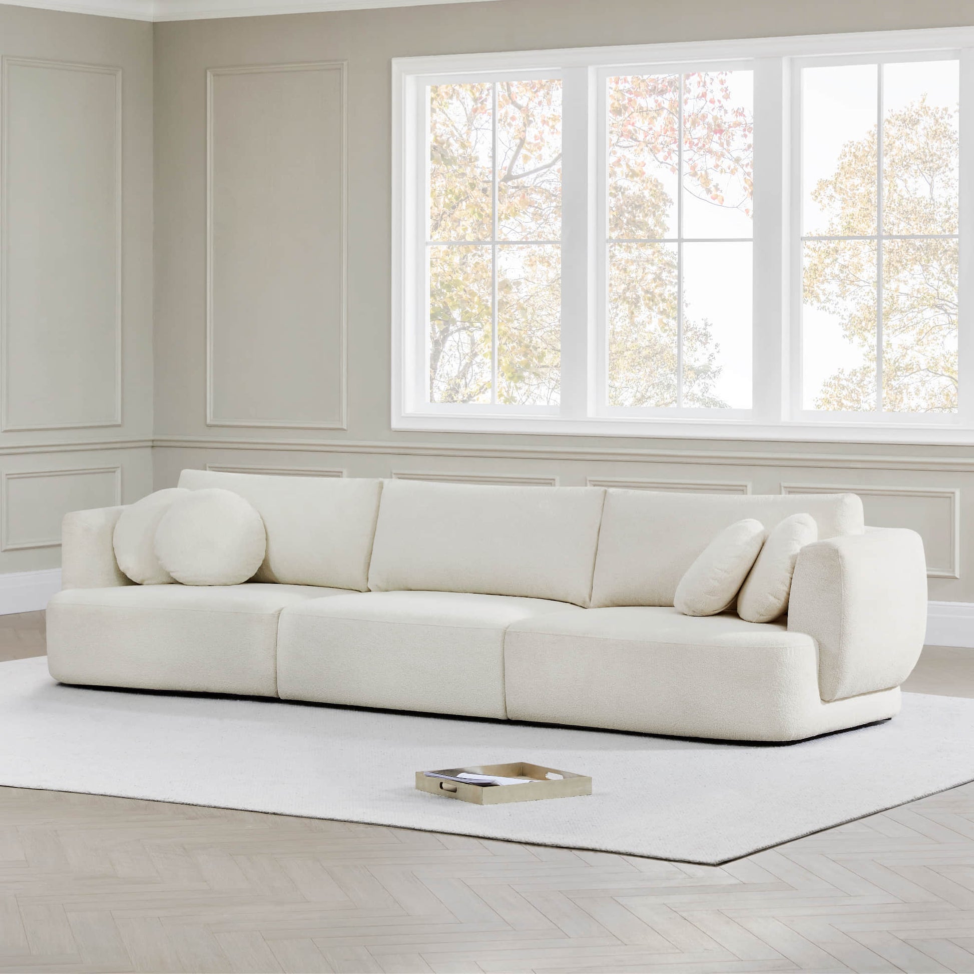 Modern Grace 3-Seat Modular Sofa with round cushions in bright living room.