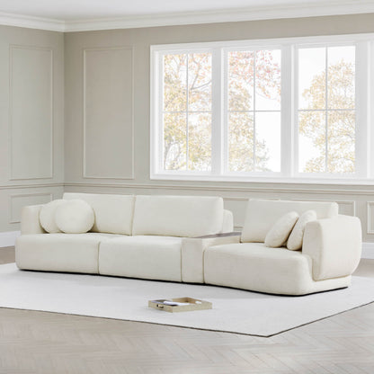 Grace 3-Seat Modular Curved Sofa with round cushions in a bright, airy modern living room - CHITA Living