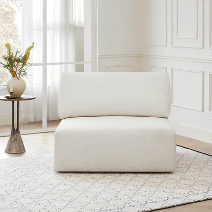 Grace modular armless sofa chair in soft boucle fabric, styled in a bright room - CHITA Living