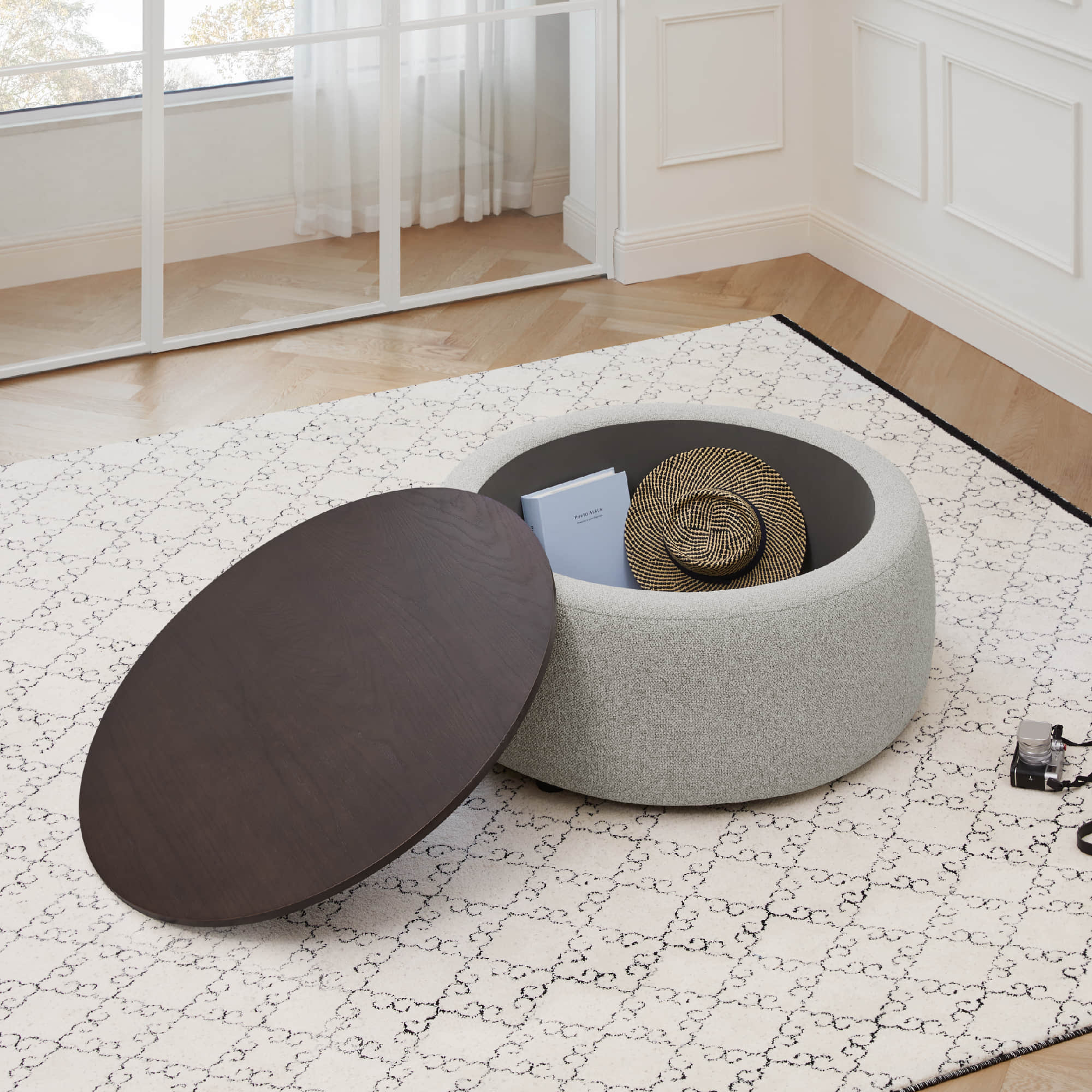 Stylish Grace round ottoman with dark wood lid and spacious hidden storage - CHITA Living